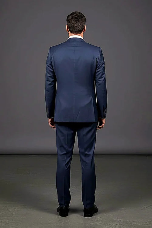 a structured blazer beside its coordinating vest, on this blue Tailored Three-Piece