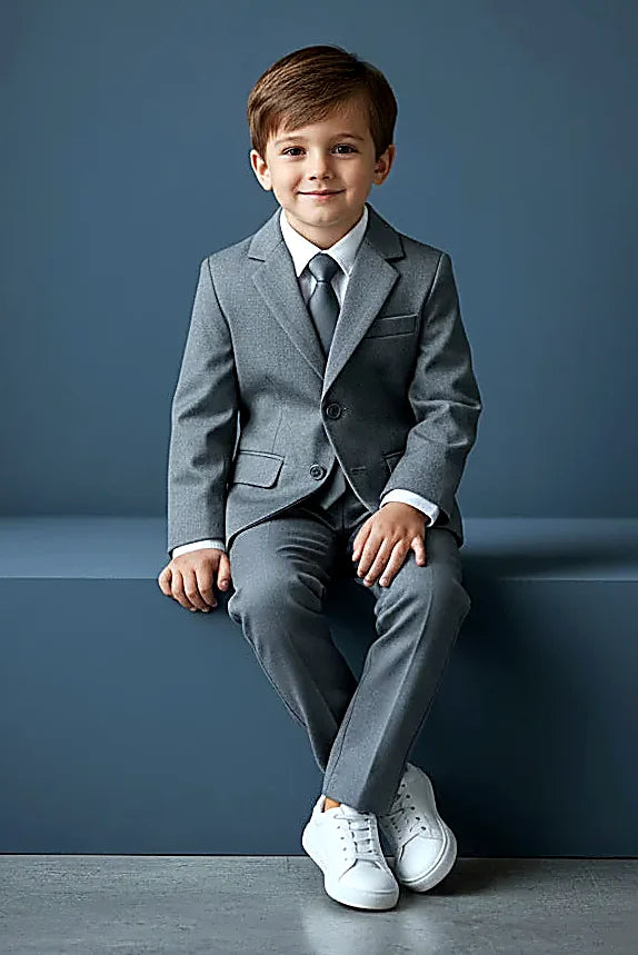 a boys three-piece set in charcoal with shirt and tie