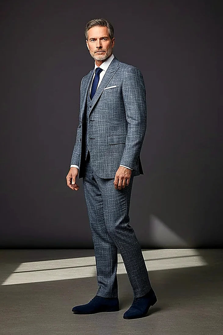 heathered chambray detailing in a luxe wool-silk blend, on this charcoal Gray Chambray Three-Piece Suit