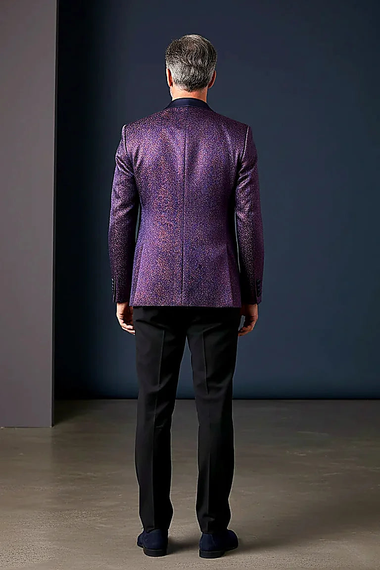 Blue Sparkle Tuxedo Blazer showing a subtle sparkle pattern over an enchanting blue base