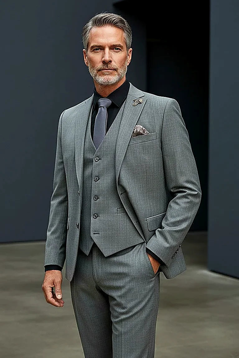 a subtle herringbone pattern in deep forest green wool, on this forest Green Herringbone Three-Piece Suit