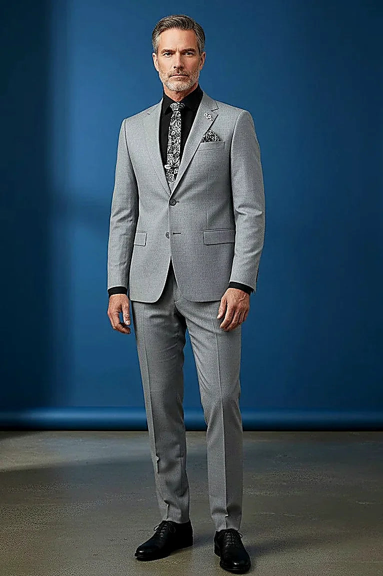 contrasting black lapels above a form-fitting vest