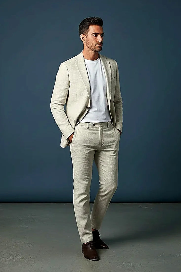 an off-white linen blend carrying a subtle woven texture, on this ivory Linen-Blend Two-Piece Suit