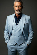 Light Blue Three-Piece Suit — peak lapels above a six-button double-breasted waistcoat