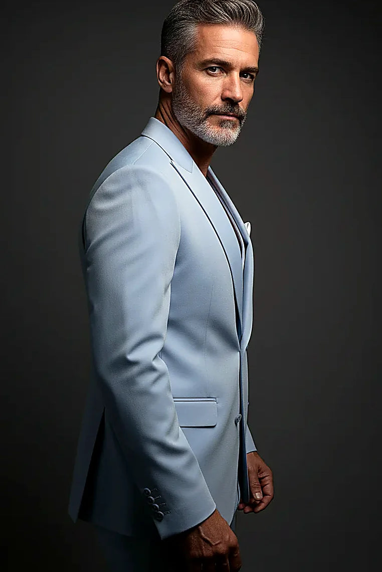 peak lapels above a six-button double-breasted waistcoat