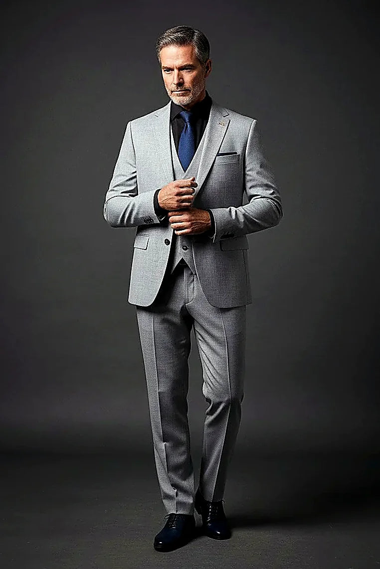 Gray Suit with Paisley Lining showing a paisley-patterned lining behind a sleek gray jacket