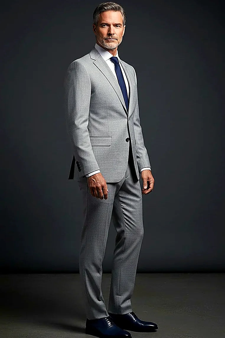 Gray Suit with Paisley Lining — a paisley-patterned lining behind a sleek gray jacket
