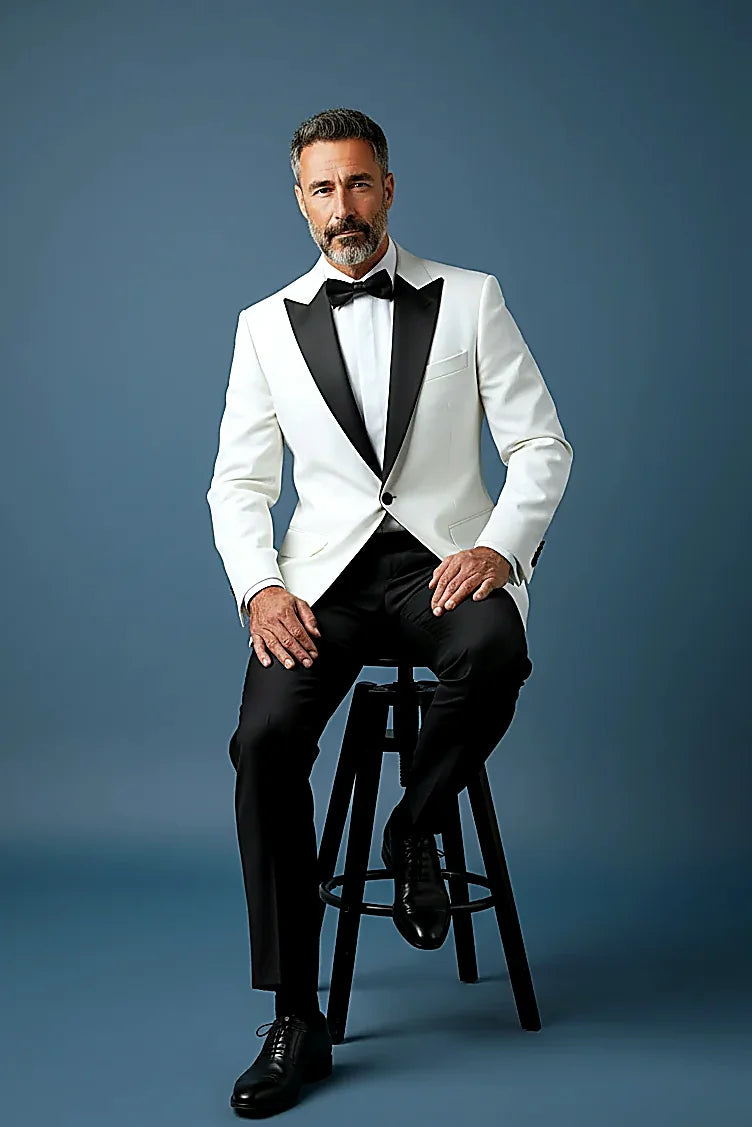 a sleek black shawl lapel against a luxurious white jacket