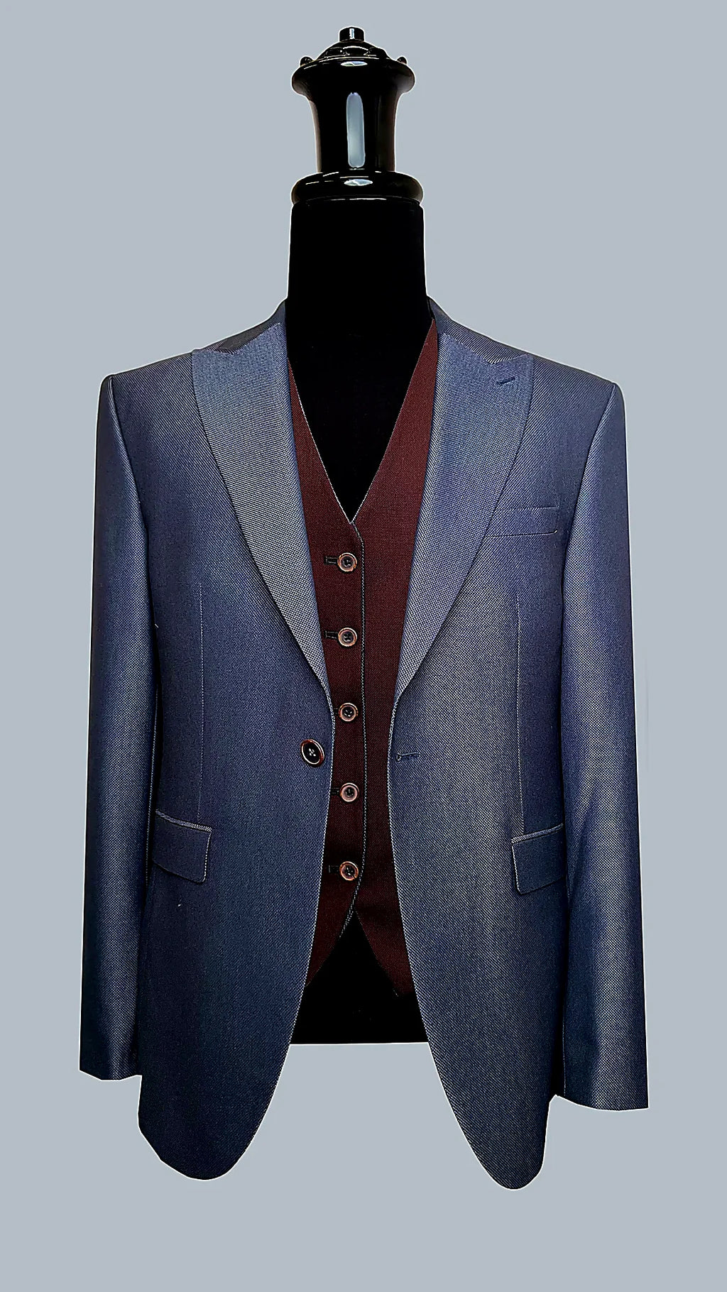 Navy Three-Piece Suit with Reversible Vest showing a reversible vest offering navy and brown faces