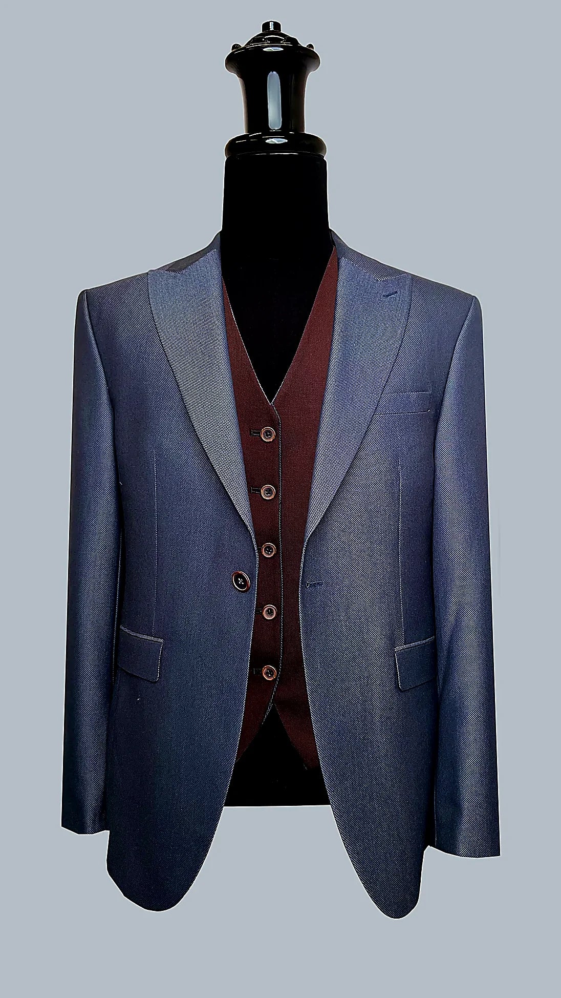 Navy Three-Piece Suit with Reversible Vest showing a reversible vest offering navy and brown faces
