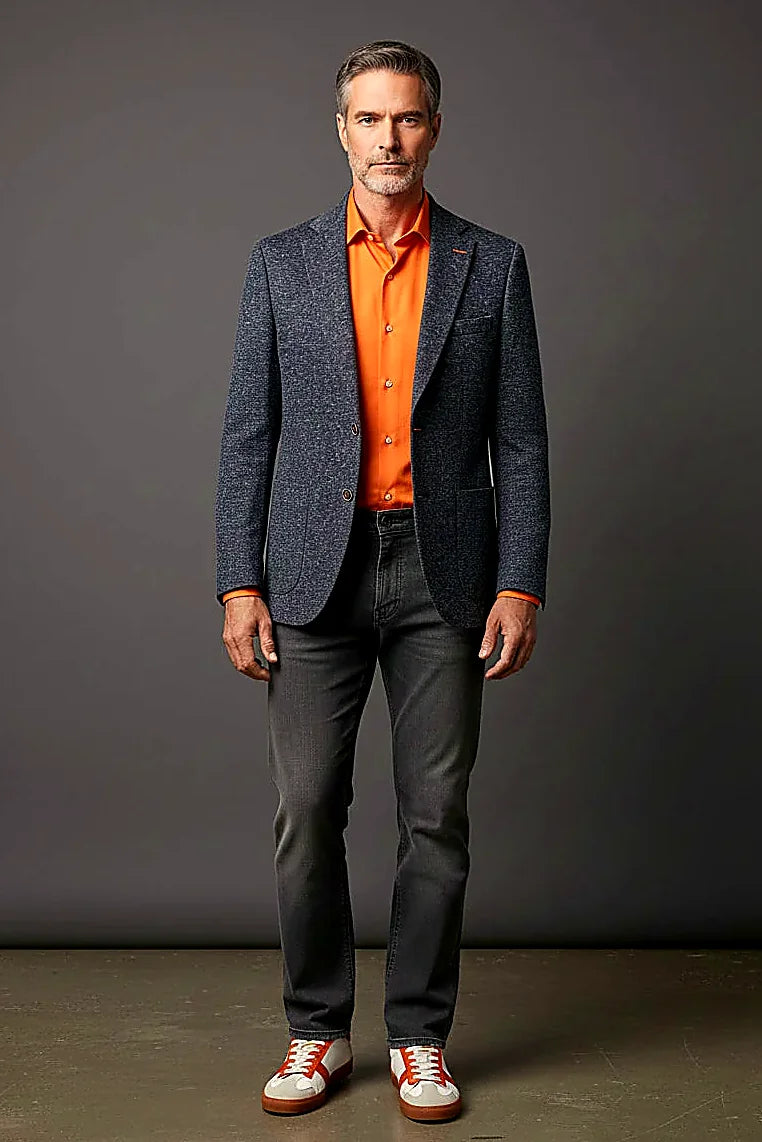 speckled navy texture lifted by subtle orange accents