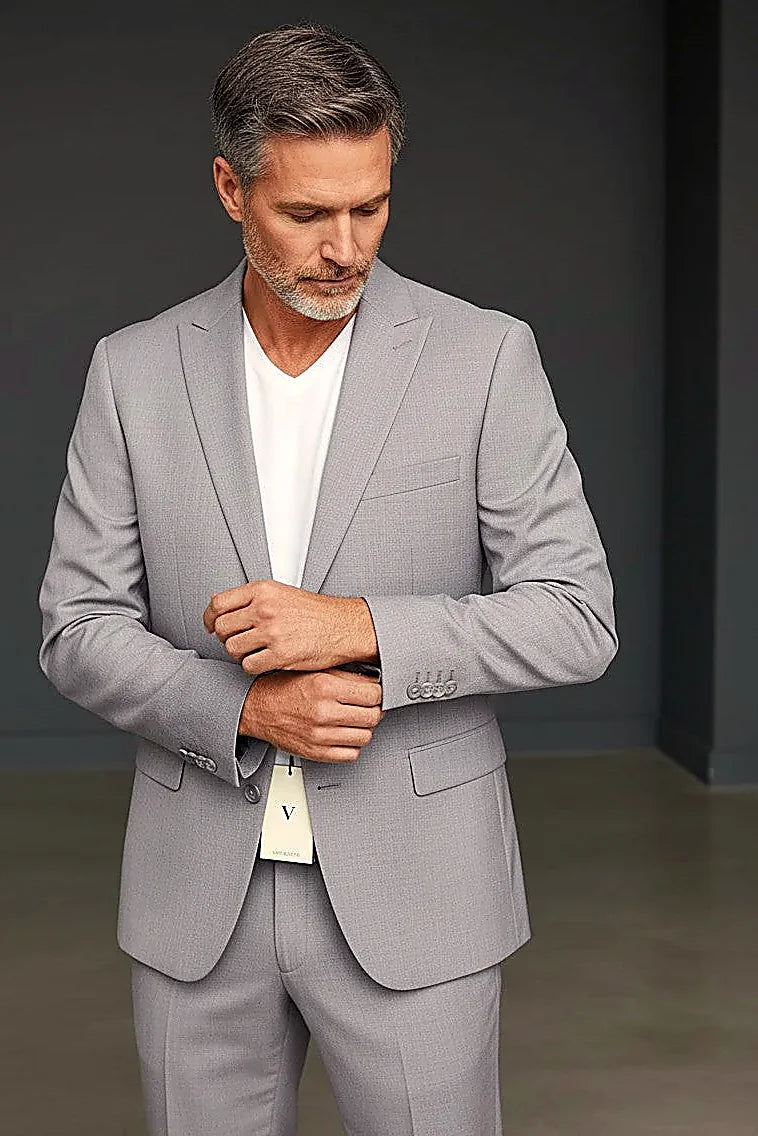 clean lines and precision cuts across a grey three-piece, on this grey Premium Three-Piece Suit