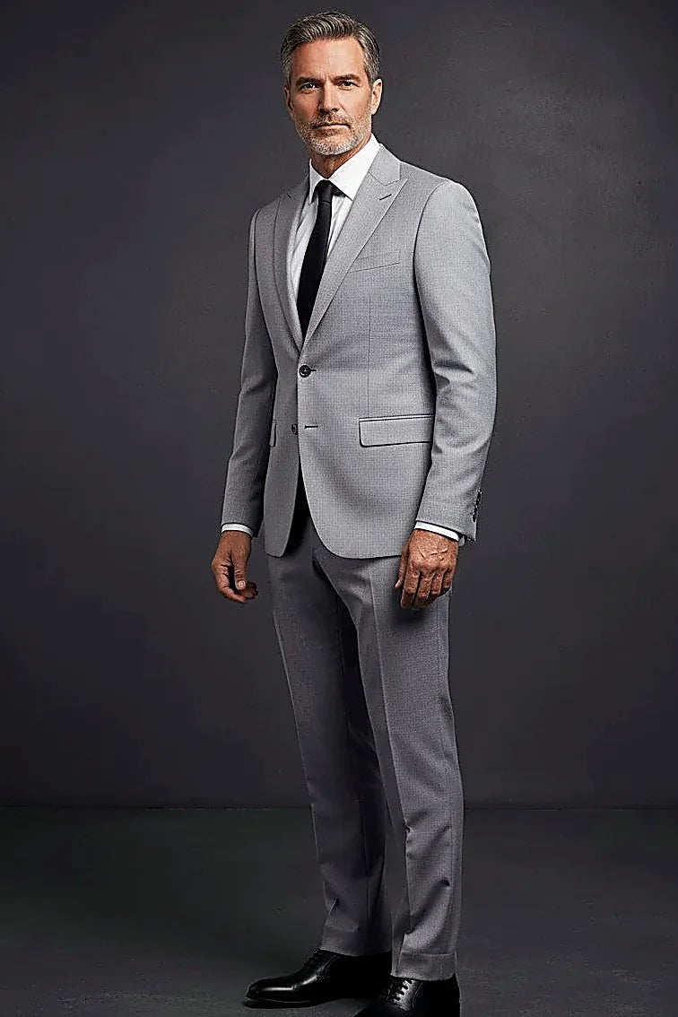 Grey Premium Three-Piece Suit — clean lines and precision cuts across a grey three-piece