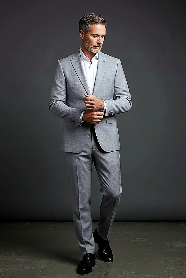 Grey Premium Three-Piece Suit showing clean lines and precision cuts across a grey three-piece