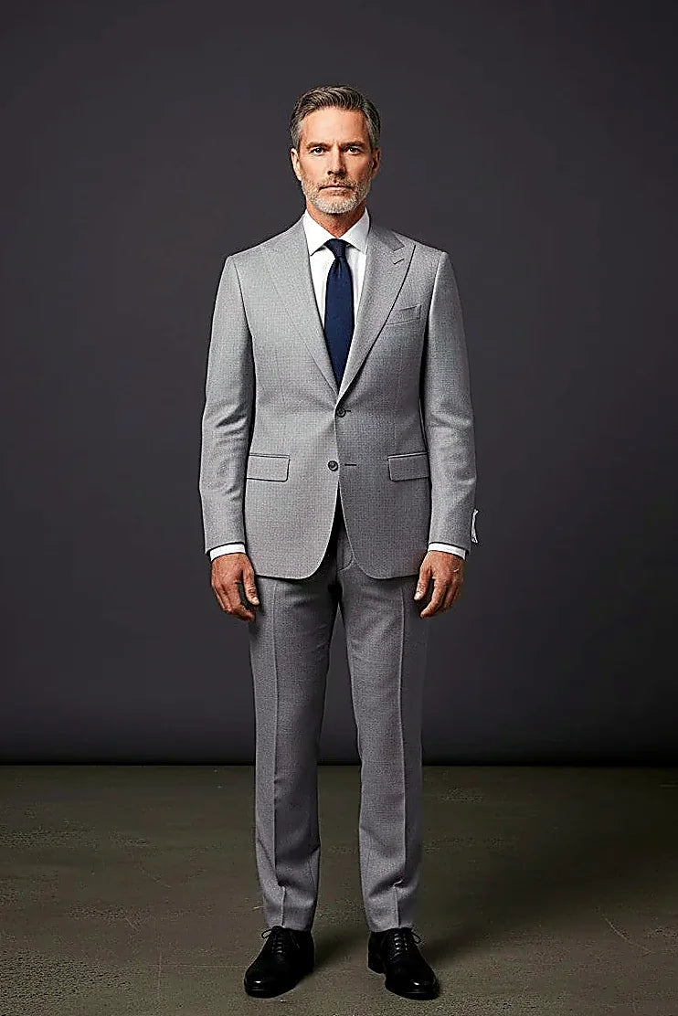 clean lines and precision cuts across a grey three-piece