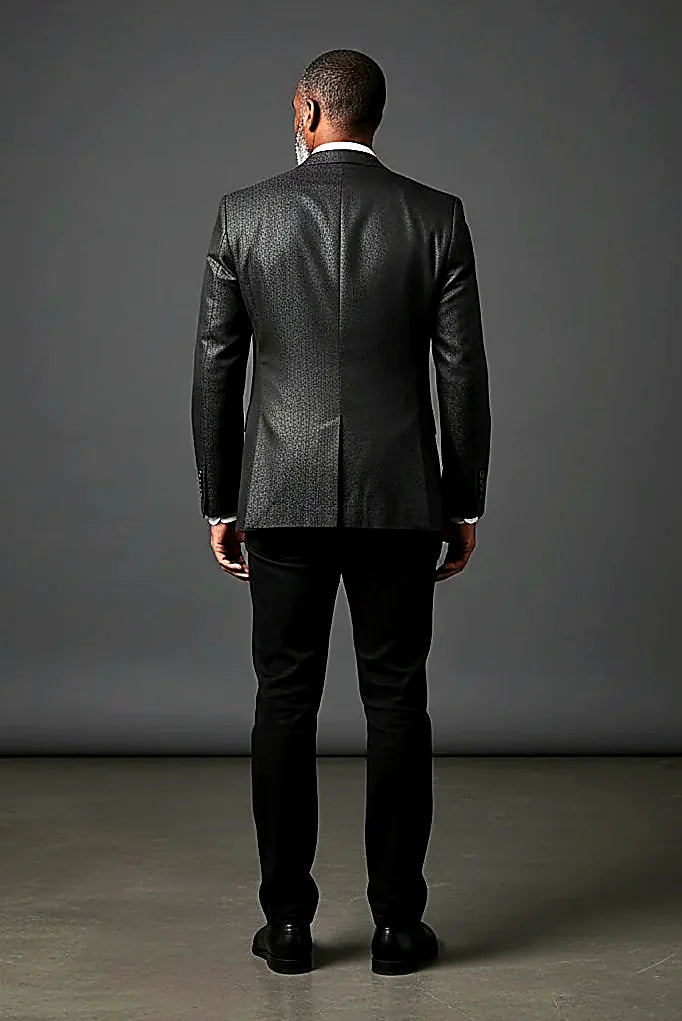 a subtle pattern adding depth to a tailored black jacket, on this black Patterned Blazer