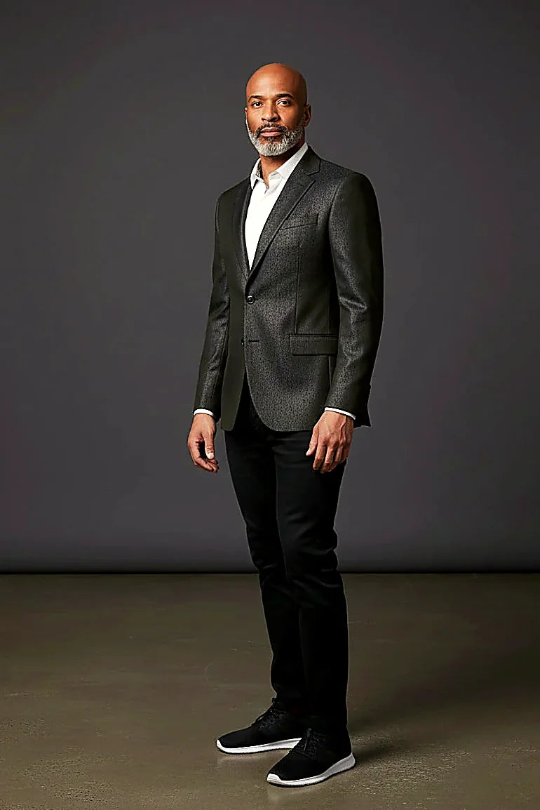 Black Patterned Blazer — a subtle pattern adding depth to a tailored black jacket