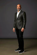 Black Patterned Blazer — a subtle pattern adding depth to a tailored black jacket