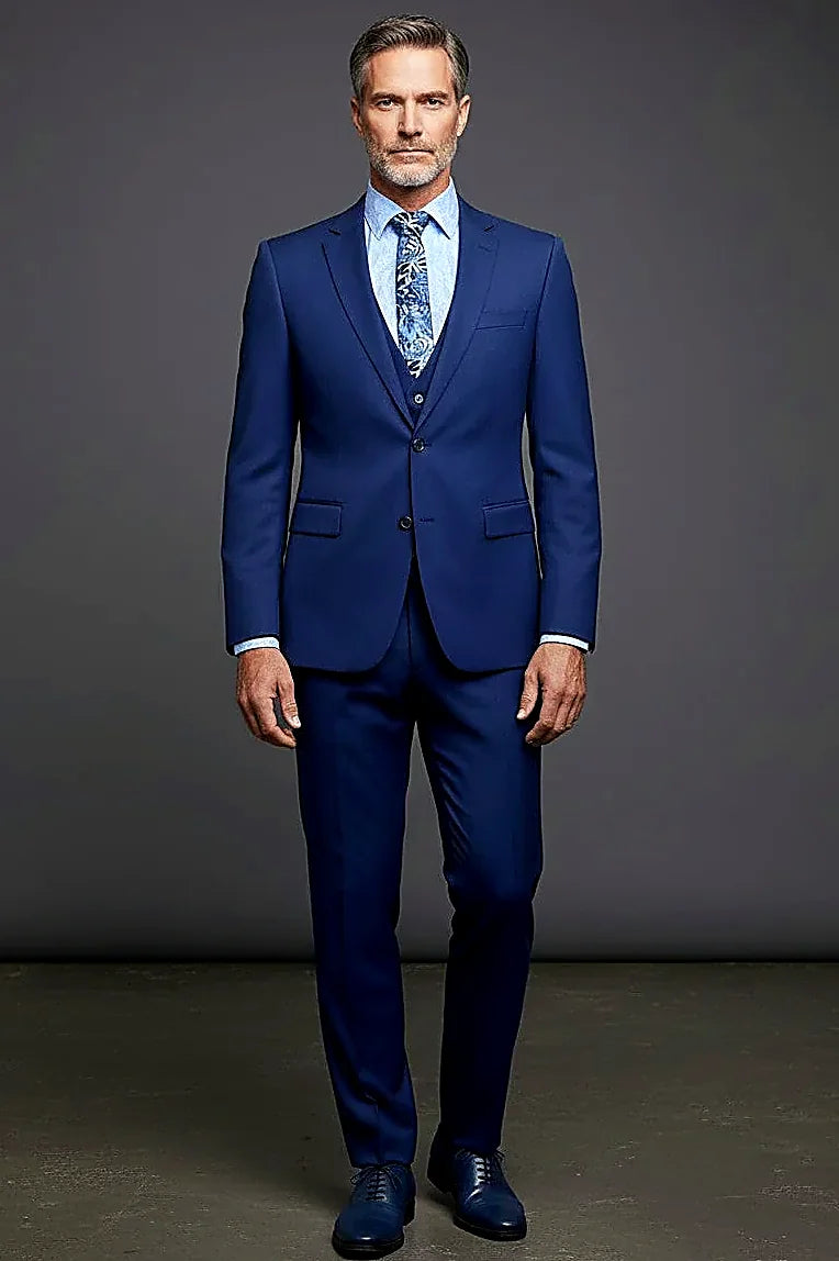 Indigo Three-Piece Suit — clean structured lines in a rich indigo cloth