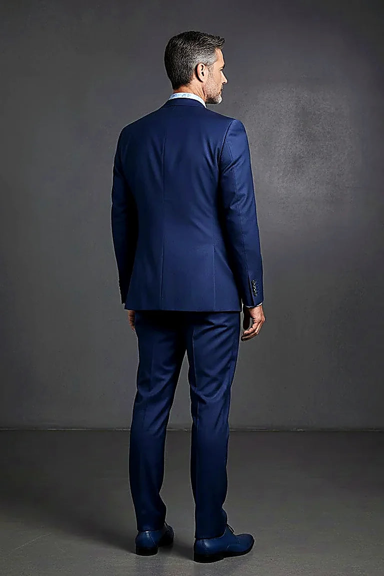 Indigo Three-Piece Suit showing clean structured lines in a rich indigo cloth