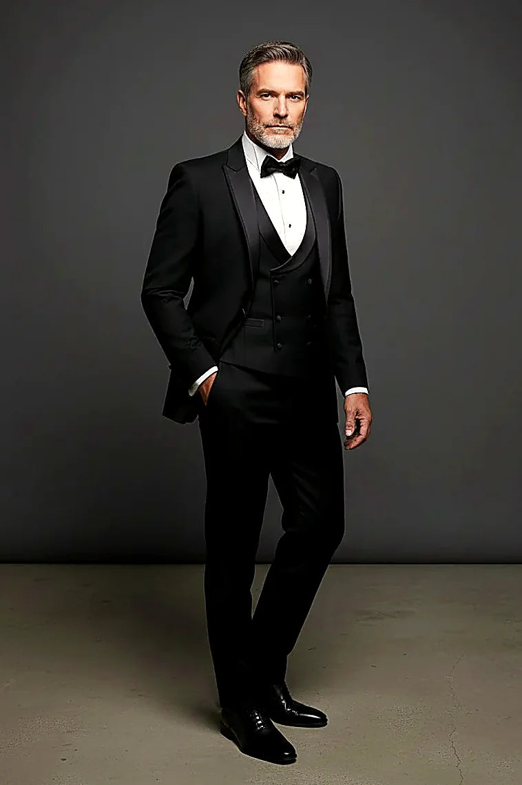 a sleek satin peak lapel with a double-breasted vest