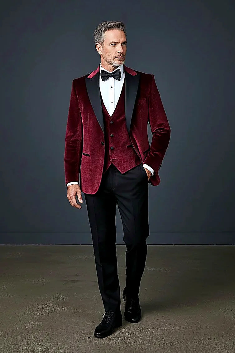 rich velvet framed by a classic satin peak lapel, on this velvet Three-Piece Tuxedo