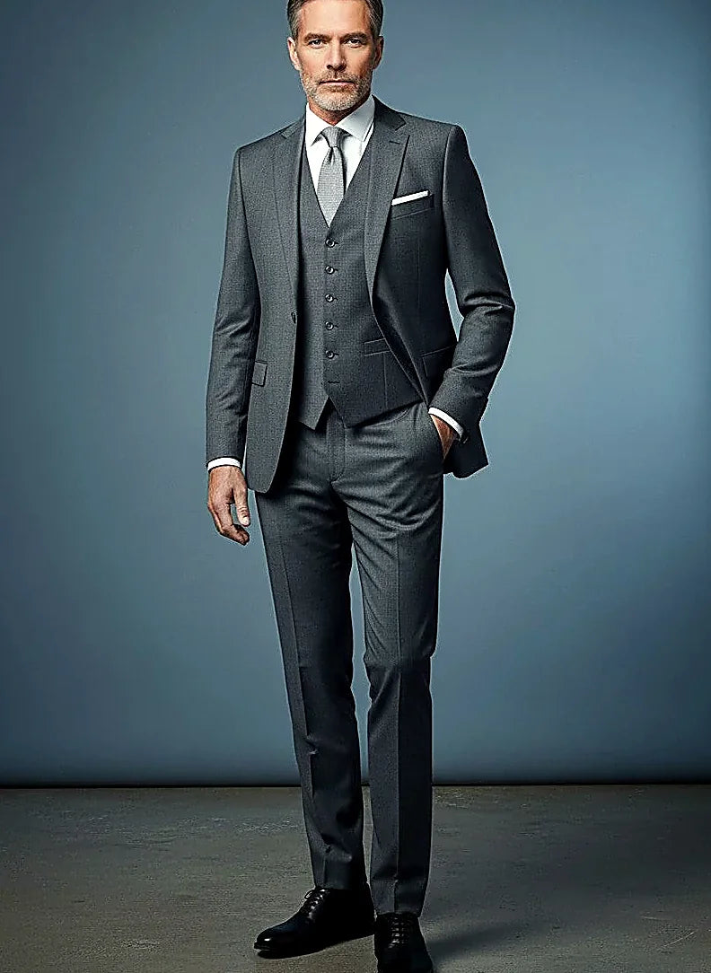 Grey Slim Fit Three-Piece Suit showing precision stitching across a slim-cut grey three-piece
