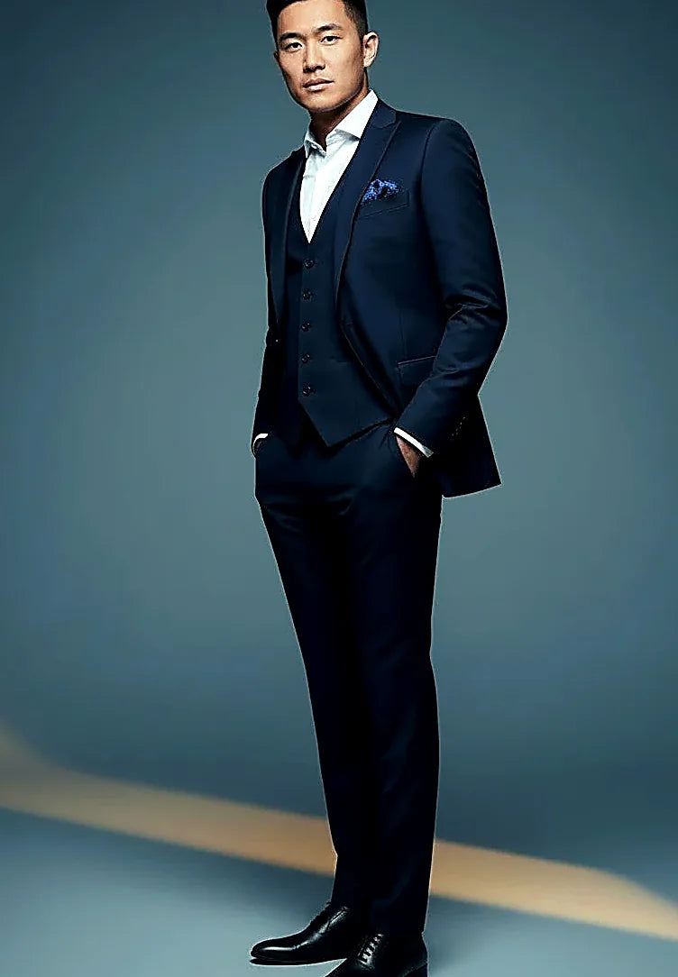 precision stitching across a slim-cut grey three-piece, on this grey Slim Fit Three-Piece Suit