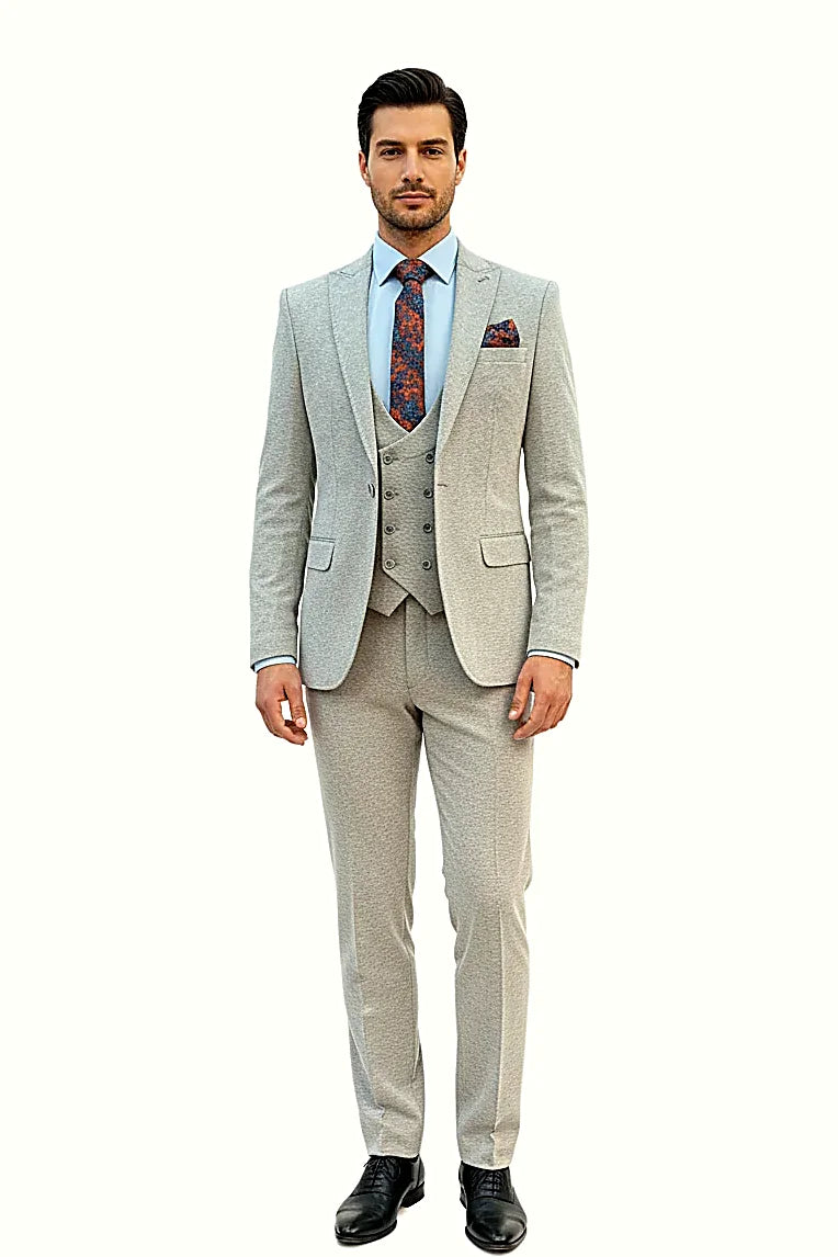 a slim-cut grey-blue jacket, vest and trousers