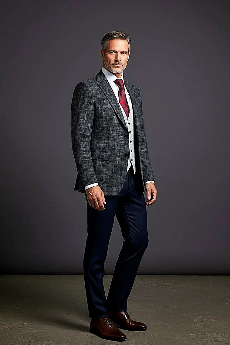 a structured blazer with coordinating trousers and vest