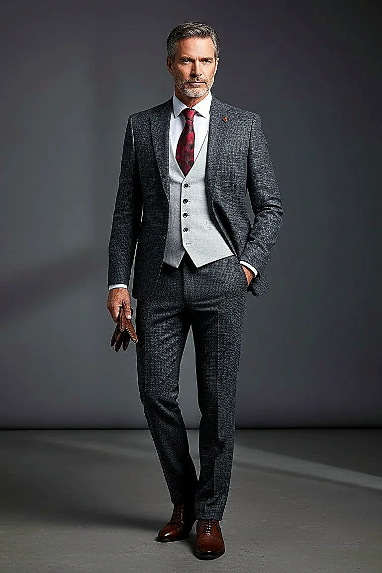a structured blazer with coordinating trousers and vest, on this classic Fit Three-Piece Suit