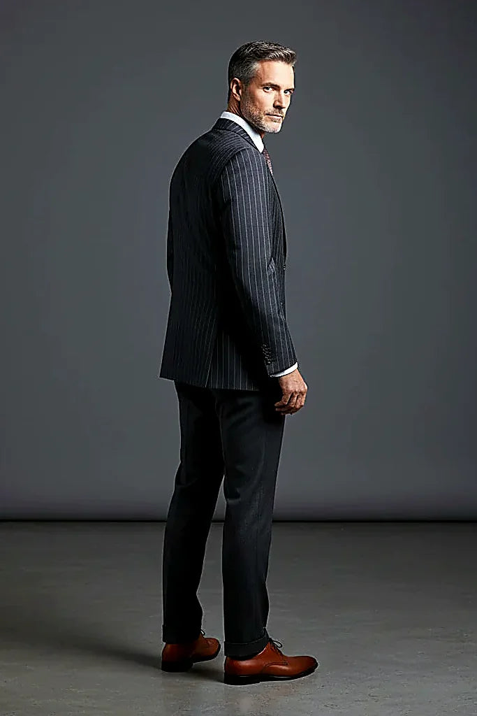 premium wool drawn into blazer, waistcoat and trousers, on this navy Three-Piece Wool Suit