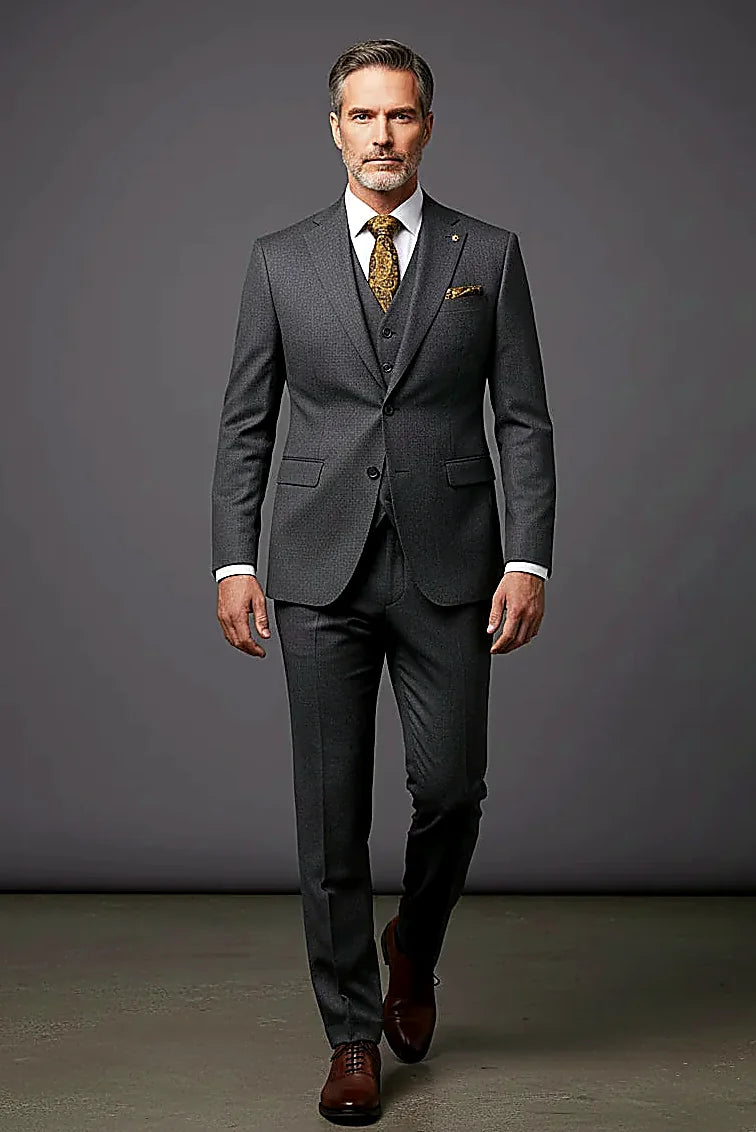hunter green cloth cut into jacket, trousers and vest